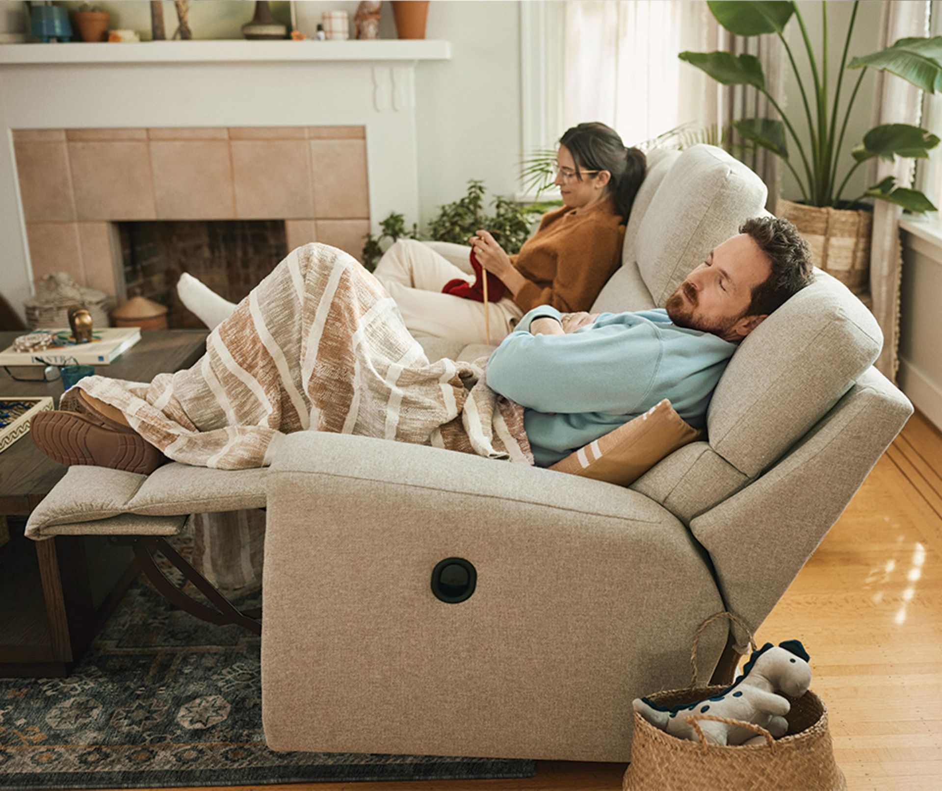 Apollo Reclining Chairs with couple sleeping and knitting