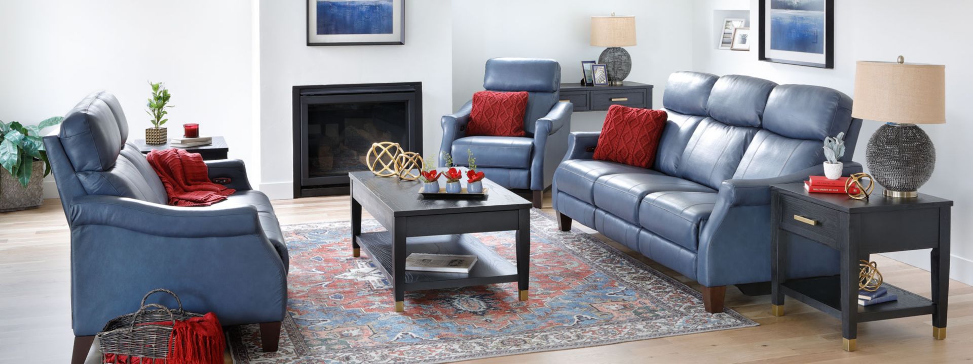 Astra Sofa Group. Blue leather Sofa, Love seat, and chair in home.