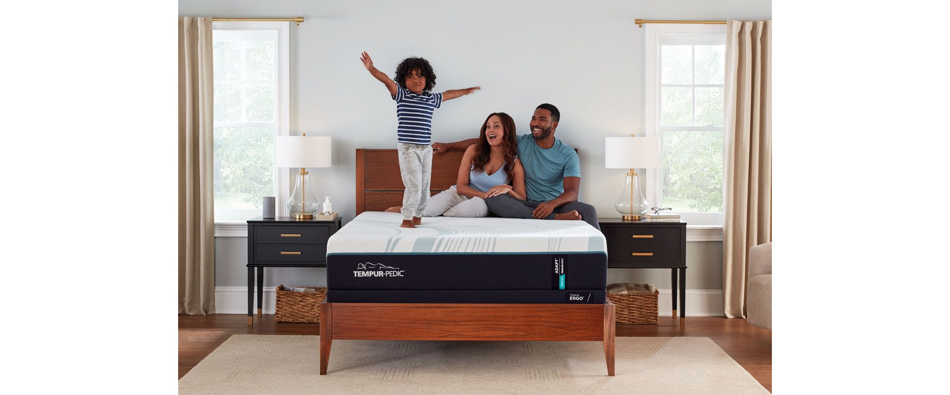 Family Sitting on Tempur Pedic Mattress