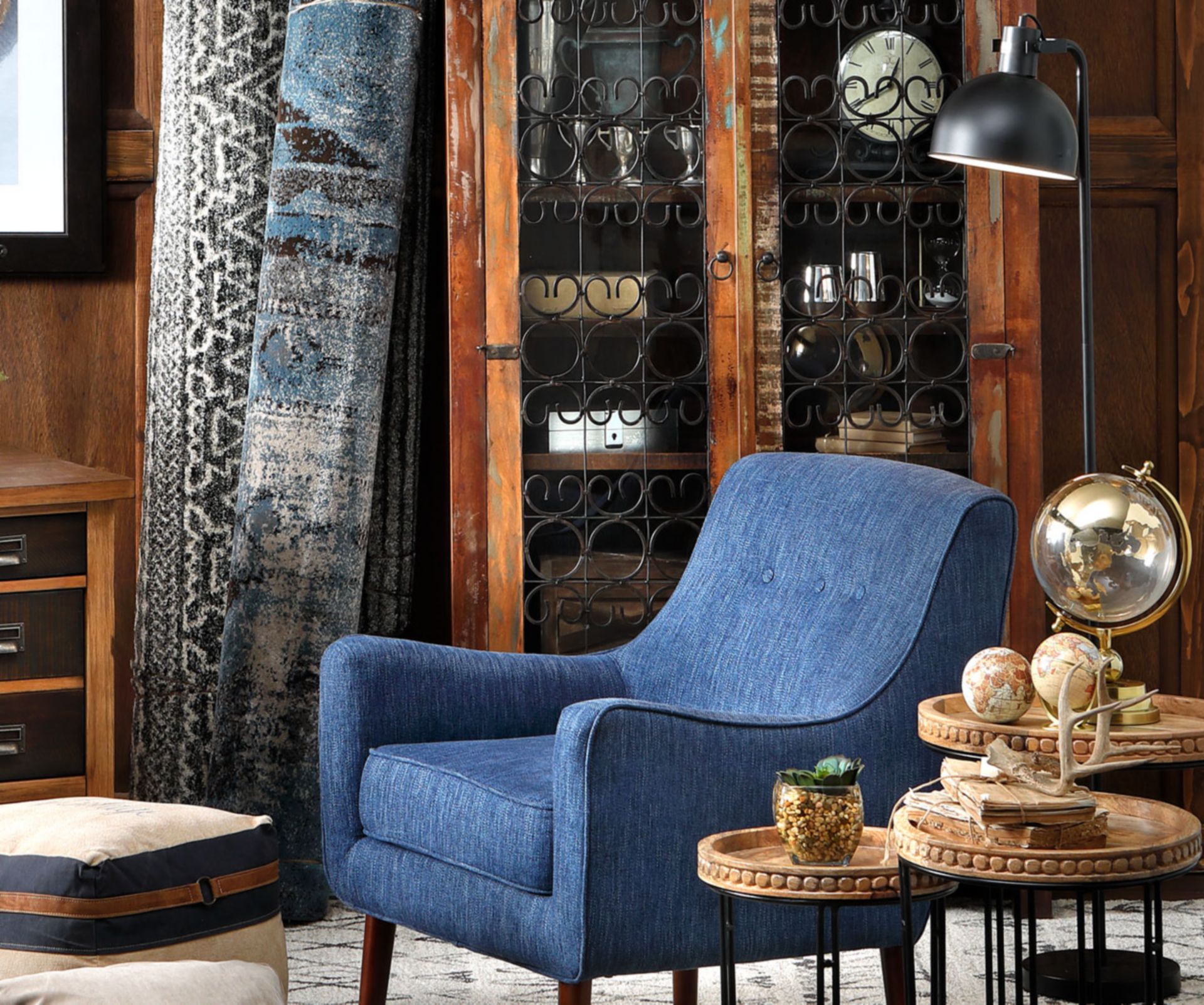 Blue accent Chair surrounded by boho decor
