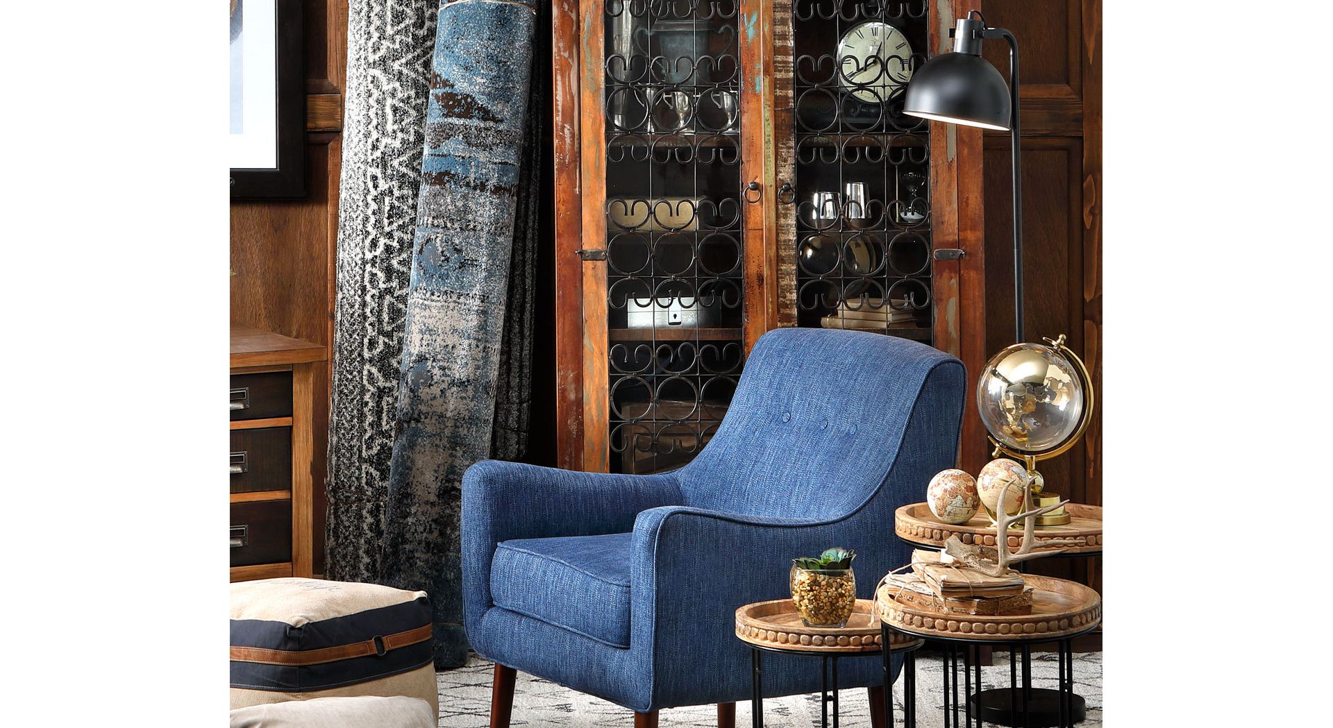 Blue accent Chair surrounded by boho decor