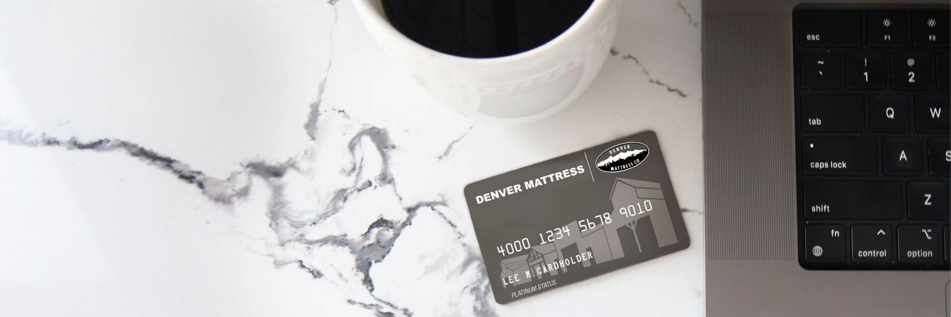 Financing Callout. Denver Mattress Card with Computer Keyboard and cup of coffee. 