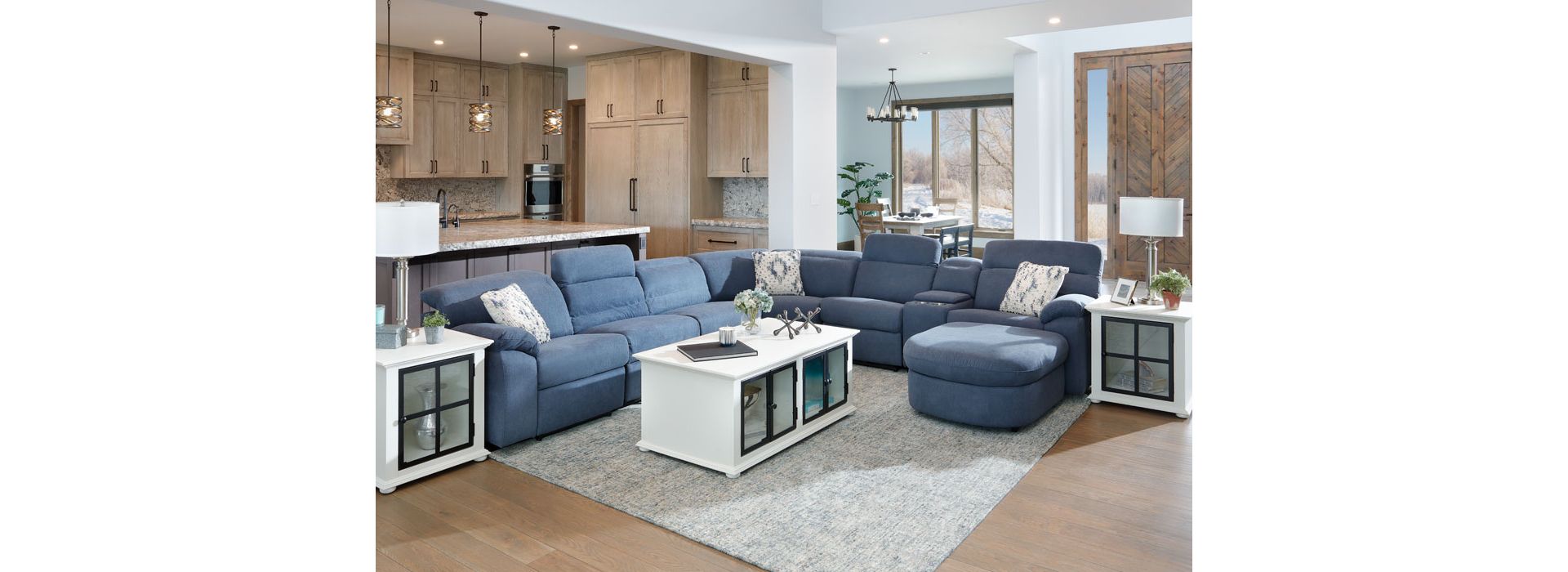 Blue Sectional with adjustable head rests, storage, and a pullout sleeper
