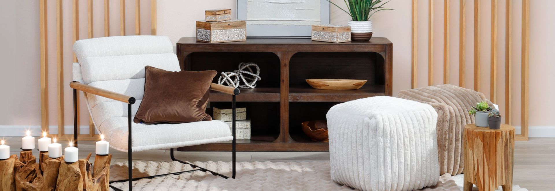 Sitting Room With White Chair and Poof, TV stand and Pink Walls. 