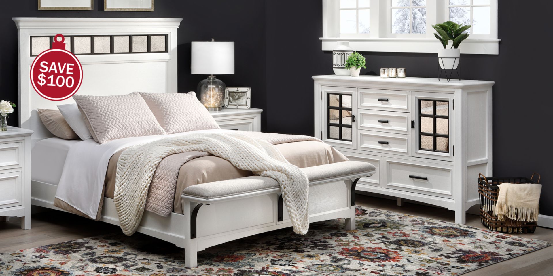 White panel bed with mirrored headboard in cozy bedroom with twinkle light lamp. Save $100.