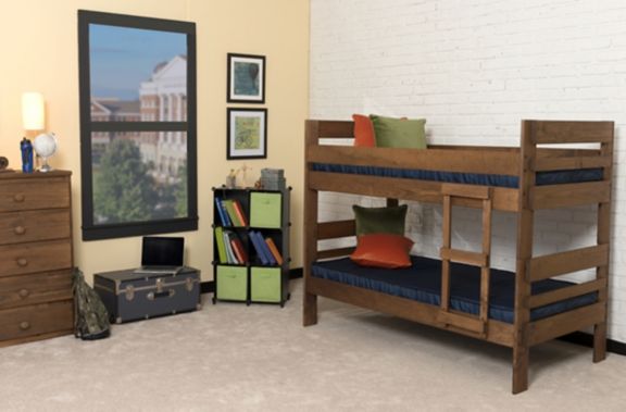 Institutional mattress from our Specialty Line pictured in a dorm room on a bunk bed