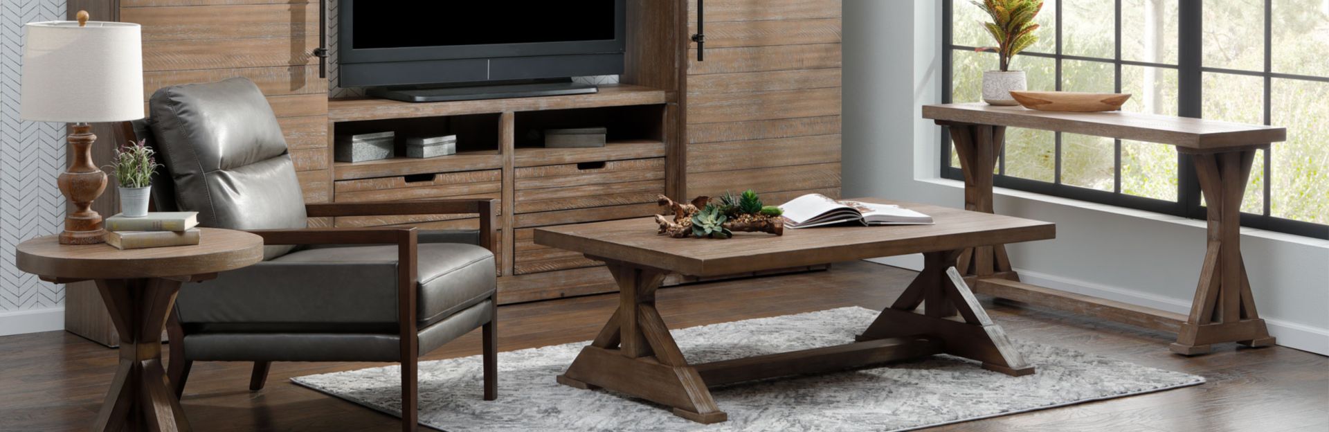 Mocha mousse colored entertainment center, coffee table, and sofa table in living room