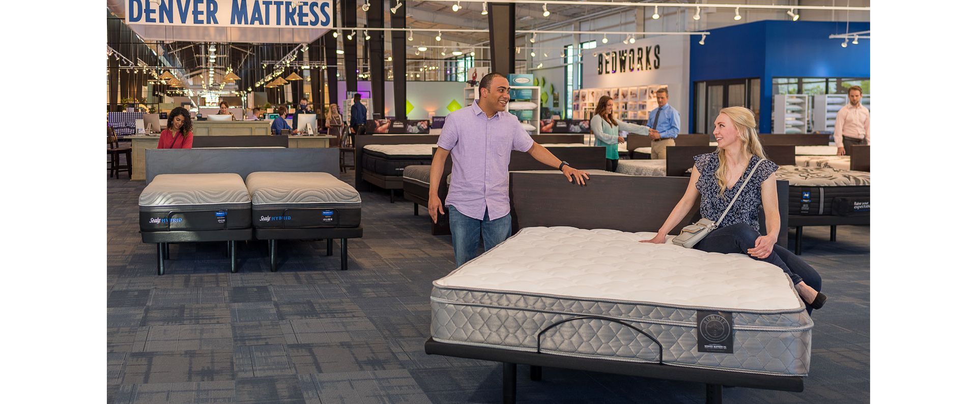 Summit Firm Mattress with Customers in Store